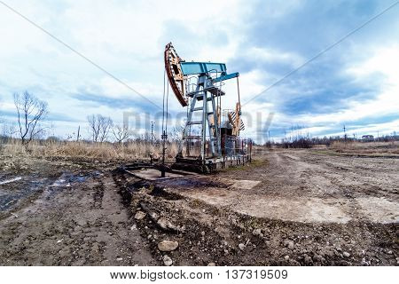 Oil pump. Oil industry equipment. Oil pumpjack or nodding horse pumping unit