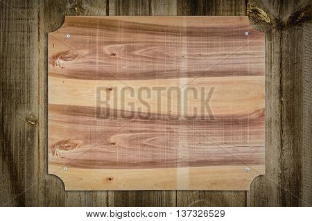 The Wooden Nameboard on the Wooden Fence