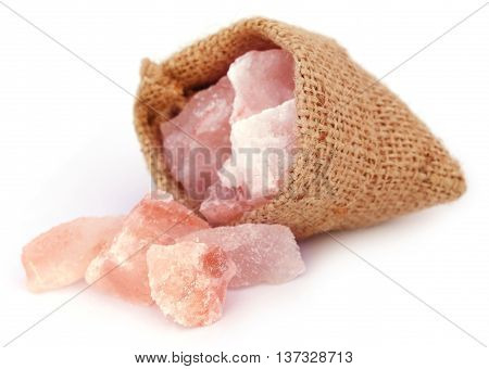 Saindhava lavana or Himalayan Pink rock salt over white background