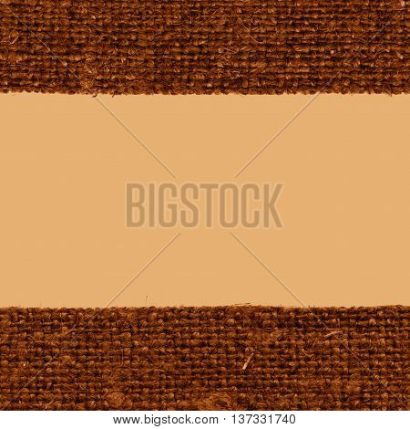 Textile weft fabric style khaki canvas jutesack material close-up background