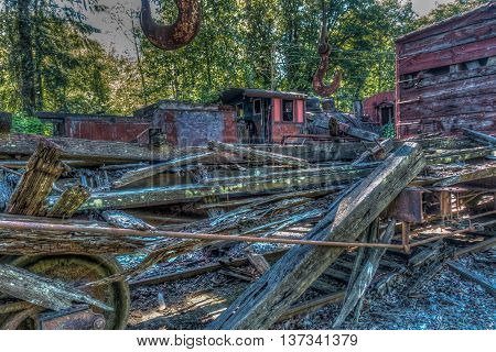 A view of wreckage in a derelict train yard. HDR image.