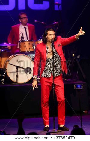 HUNTINGTON, NY-MAR 7: Singer Nasri (R) of the reggae fusion band Magic! performs in concert at The Paramount on March 7, 2015 in Huntington, New York.