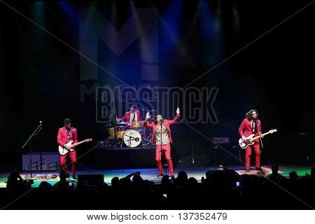HUNTINGTON, NY-MAR 7: (L-R) Mark Pellizzer, Alex Tanas, Nasri and Ben Spivak of the reggae fusion band Magic! performs in concert at The Paramount on March 7, 2015 in Huntington, New York.