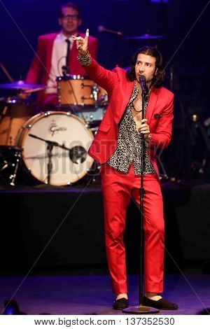 HUNTINGTON, NY-MAR 7: Singer Nasri (R) of the reggae fusion band Magic! performs in concert at The Paramount on March 7, 2015 in Huntington, New York.
