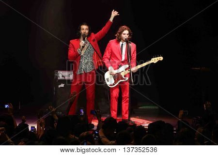 HUNTINGTON, NY-MAR 7: Singer Nasri (L) and Ben Spivak of the reggae fusion band Magic! performs in concert at The Paramount on March 7, 2015 in Huntington, New York.