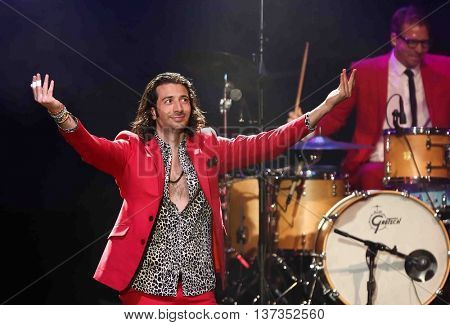 HUNTINGTON, NY-MAR 7: Singer Nasri (L) of the reggae fusion band Magic! performs in concert at The Paramount on March 7, 2015 in Huntington, New York.