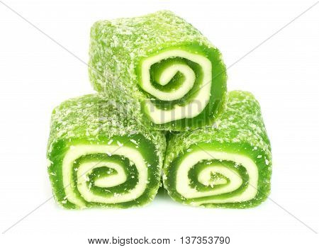 Green candied fruit jelly on a white background