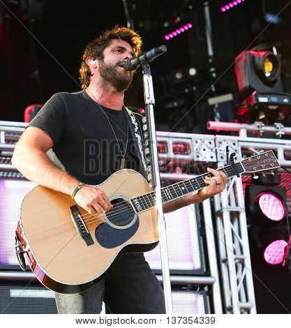 NASHVILLE-JUL 11: Country recording artist Thomas Rhett performs during Luke Bryan's 'Kick The Dust Up' Tour at Vanderbilt Stadium on July 11, 2015 in Nashville, Tennessee.