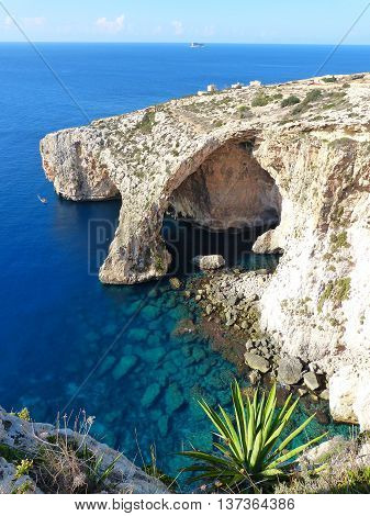 Natural arch of Blue Grotto in Malta.