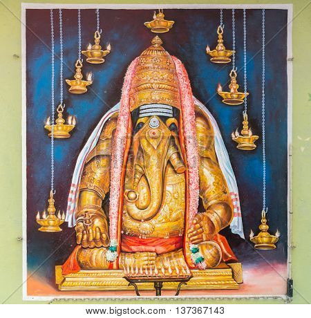 Tamil Nadu India - October 18 2013: Pillayarpatti Karpaga Vinayagar temple. Image of the idol Ganesha is fixed on the ceiling of the Mandapam in front of the entrance. His pose represent the OM symbol.