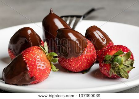 Juicy strawberry with milk chocolate