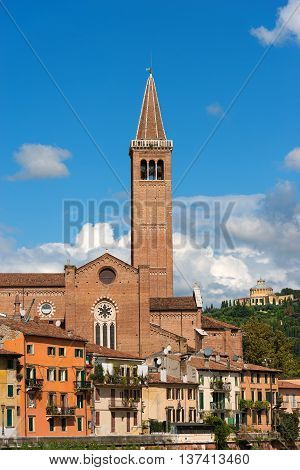 The church of St. Anastasia (1290-1471) on blue sky with clouds in Verona (UNESCO world heritage site) Veneto Italy