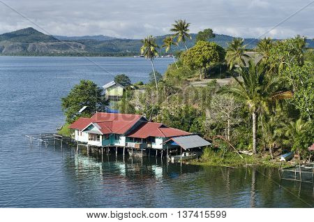 House On An Island On The Lake Of Sentani
