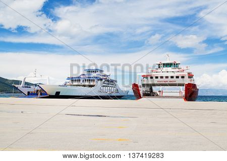 Thassos, Greece - May 3, 2016: Thassos port and ferry boats ready for loading