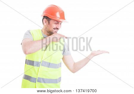 Cheerful Constructor Pointing Finger To Something
