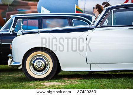 MINSK BELARUS - MAY 07 2016: Close-up photo of retro Rolls Royce. Classic vintage cars side view. Selective focus.