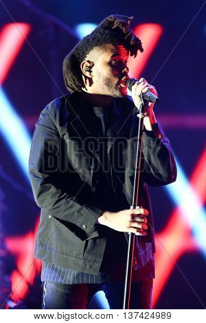 HOLLYWOOD, CA-OCT 24: The Weeknd performs onstage during CBS RADIOs third annual We Can Survive, presented by Chrysler, at the Hollywood Bowl on October 24, 2015 in Hollywood, California.