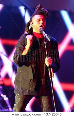 HOLLYWOOD, CA-OCT 24: The Weeknd performs onstage during CBS RADIOs third annual We Can Survive, presented by Chrysler, at the Hollywood Bowl on October 24, 2015 in Hollywood, California.