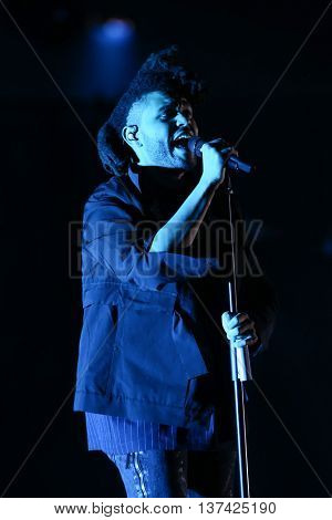 HOLLYWOOD, CA-OCT 24: The Weeknd performs onstage during CBS RADIOs third annual We Can Survive, presented by Chrysler, at the Hollywood Bowl on October 24, 2015 in Hollywood, California.