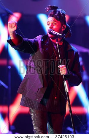 HOLLYWOOD, CA-OCT 24: The Weeknd performs onstage during CBS RADIOs third annual We Can Survive, presented by Chrysler, at the Hollywood Bowl on October 24, 2015 in Hollywood, California.
