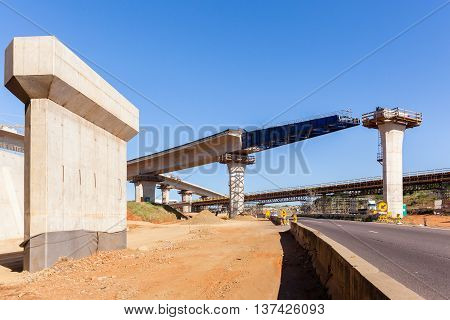 Construction industry new traffic road highway intersection junction flyover ramps of concrete steel design.