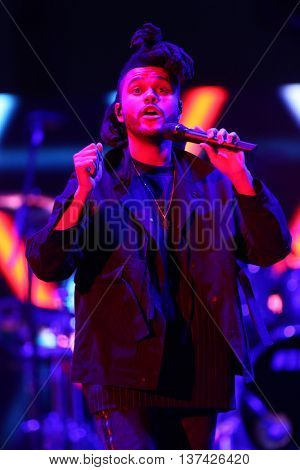 HOLLYWOOD, CA-OCT 24: The Weeknd performs onstage during CBS RADIOs third annual We Can Survive, presented by Chrysler, at the Hollywood Bowl on October 24, 2015 in Hollywood, California.