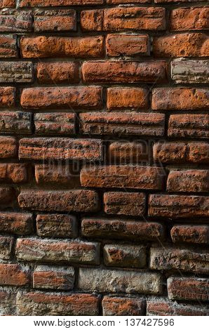 Texture pof a grunge red brick wall background.