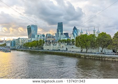 Twinlight cityscape of City of London and Thames River, England, United Kingdom