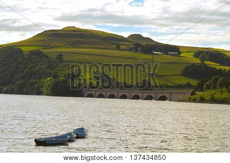 View of boats on Ladybower Reservoir, located in the Peak District National Park