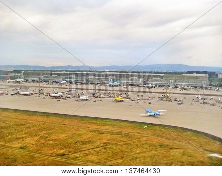 Frankfurt am Main Germany - July 9 2008: Airport Frankfurt / Main - Terminal with airplanes in parking position. View from runway during landing.
