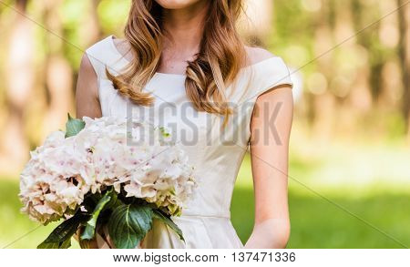 Beautiful bride with flowers