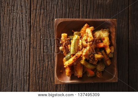 acar or thai salad on the wooden background