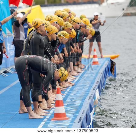 STOCKHOLM - JUL 02 2016: The female swimmers just before the start signal in the Women's ITU World Triathlon series event July 02 2016 in Stockholm Sweden