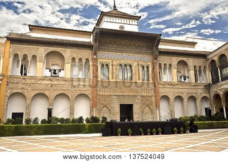 SEVILLE, SPAIN - September 12, 2015: View of King Peter of Castile Palace from the Patio de la Monteria Alcazar of Seville on September 12, 2015 in Seville, Spain