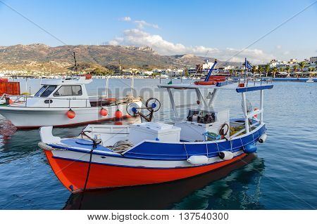 Beautiful fishing boat staing parked at harbour of Sitia town on Crete island, Greece