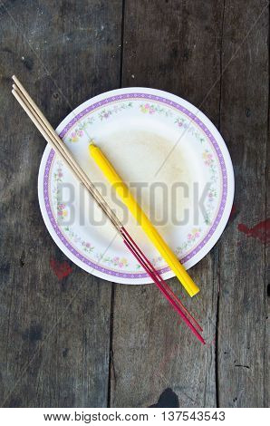 incense and candle for give alms to a Buddhist monk