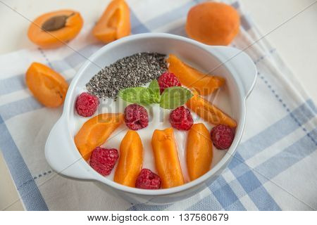 Yogurt with chia seeds, raspberries and apricot