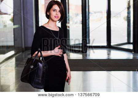 Portrait of attractive woman in a mall