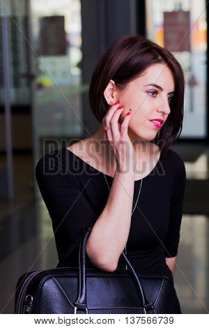 Portrait of attractive woman in a mall