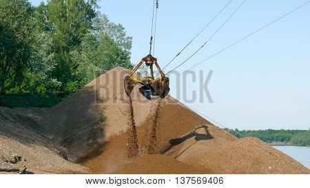sand crane excavator summer works barge river