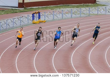 Chelyabinsk Russia - July 01 2016: running men athletes at sprint distance of 200 meters during Ural championship in athletics