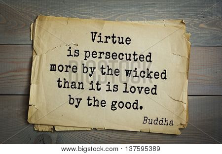 Buddha quote on old paper background. Virtue is persecuted more by the wicked than it is loved by the good. 