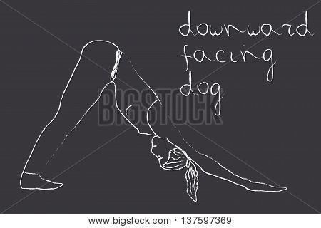 Yoga downward facing dog pose in chalk on blackboard
