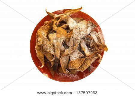 Cruller powder on the plate isolated background