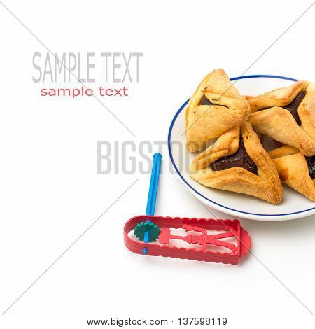 Hamantaschen cookies and grogger forJewish festival of Purim