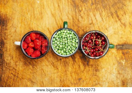 Colorful Mix Of Fruits On Black Background. View From Above. Fresh Organic Berries ,  So You Can Eat