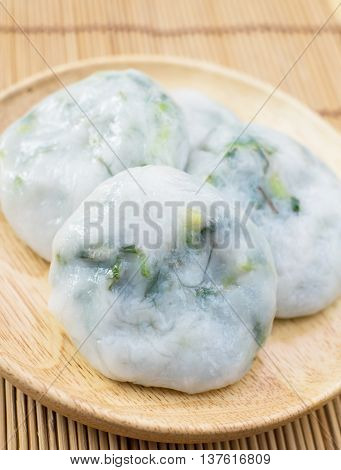 Set of Garlic chives on wood dish background