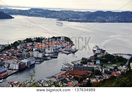 BERGEN, NORWAY - AUGUST 10, 2014: View to the historical buildings and cruise harbor of Bergen from Floyen hill in Bergen, Norway. Bergen is one of the major tourist destinations of Norway.