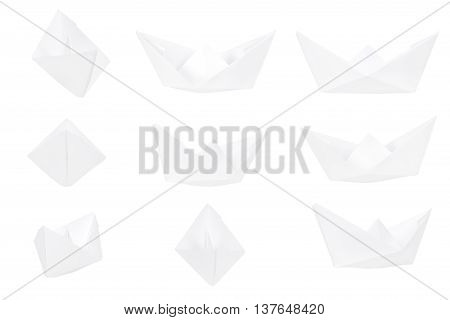 Different views of a paper boat isolated on white background. Paper fold boats for your creative project.