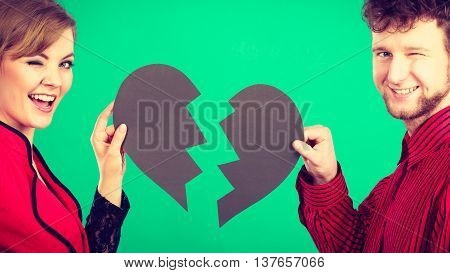 Smiling Couple Fixing Heart.